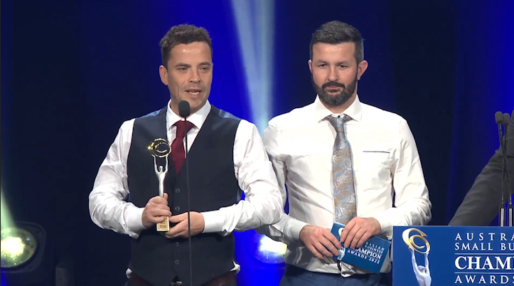 Next Level Elevators receiving an award.